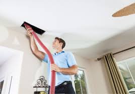 Home Safe Dryer Vent Cleaning technician cleaning commercial air ducts in Troy, Lincoln County, Missouri